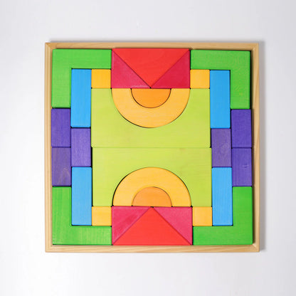 Create, stack and build with Grimm's Basic Building Set. A 30-piece wooden block set designed to inspire imaginative, open-ended play from an early age.