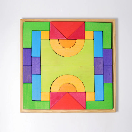 Create, stack and build with Grimm's Basic Building Set. A 30-piece wooden block set designed to inspire imaginative, open-ended play from an early age.