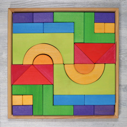 Create, stack and build with Grimm's Basic Building Set. A 30-piece wooden block set designed to inspire imaginative, open-ended play from an early age.