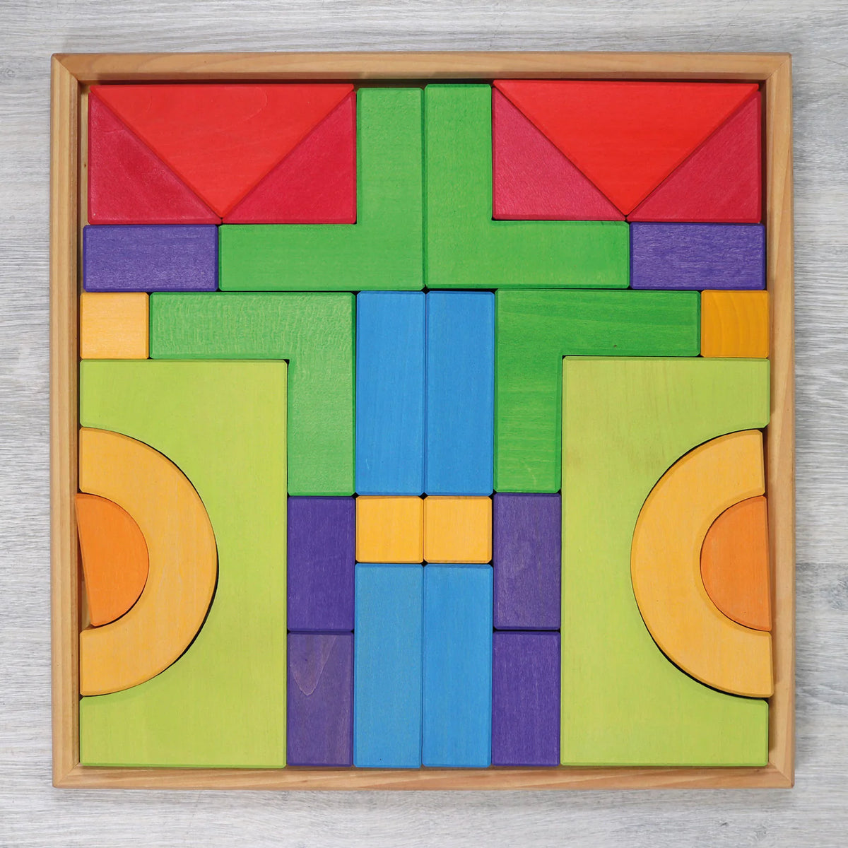 Create, stack and build with Grimm's Basic Building Set. A 30-piece wooden block set designed to inspire imaginative, open-ended play from an early age.