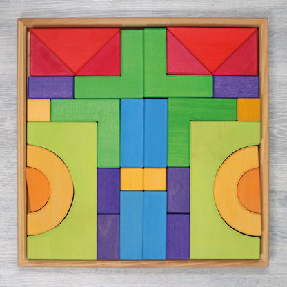 Create, stack and build with Grimm's Basic Building Set. A 30-piece wooden block set designed to inspire imaginative, open-ended play from an early age.