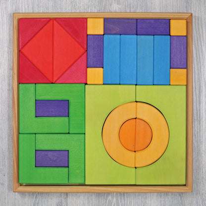 Create, stack and build with Grimm's Basic Building Set. A 30-piece wooden block set designed to inspire imaginative, open-ended play from an early age.