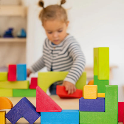 Create, stack and build with Grimm's Basic Building Set. A 30-piece wooden block set designed to inspire imaginative, open-ended play from an early age.