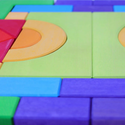 Create, stack and build with Grimm's Basic Building Set. A 30-piece wooden block set designed to inspire imaginative, open-ended play from an early age.