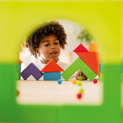 Create, stack and build with Grimm's Basic Building Set. A 30-piece wooden block set designed to inspire imaginative, open-ended play from an early age.