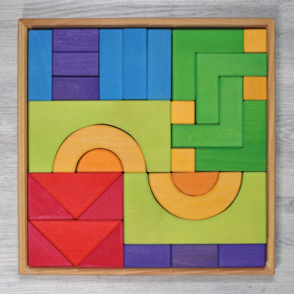 Create, stack and build with Grimm's Basic Building Set. A 30-piece wooden block set designed to inspire imaginative, open-ended play from an early age.