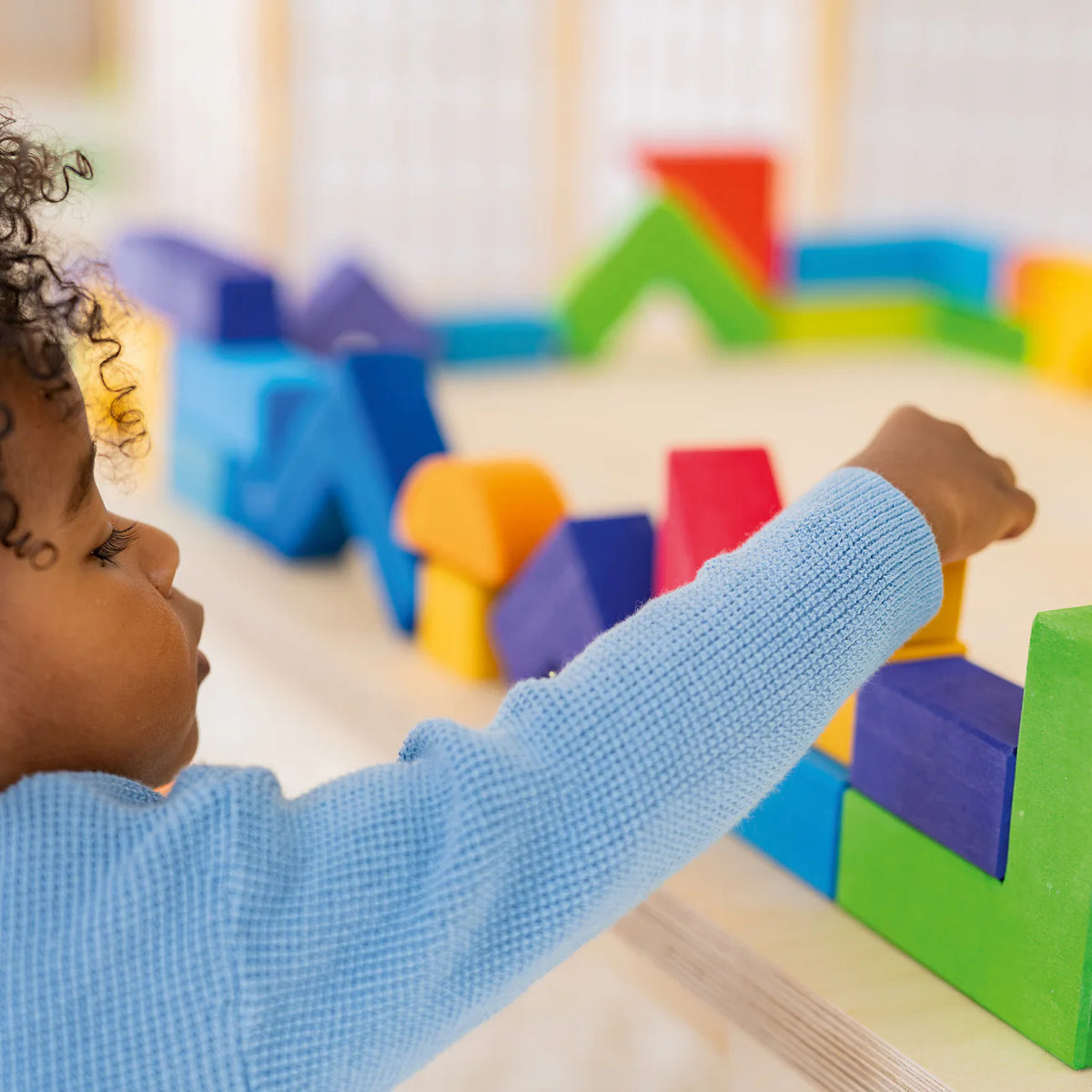 Create, stack and build with Grimm's Basic Building Set. A 30-piece wooden block set designed to inspire imaginative, open-ended play from an early age.