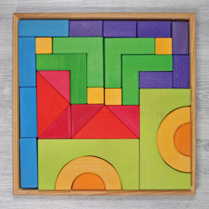 Create, stack and build with Grimm's Basic Building Set. A 30-piece wooden block set designed to inspire imaginative, open-ended play from an early age.
