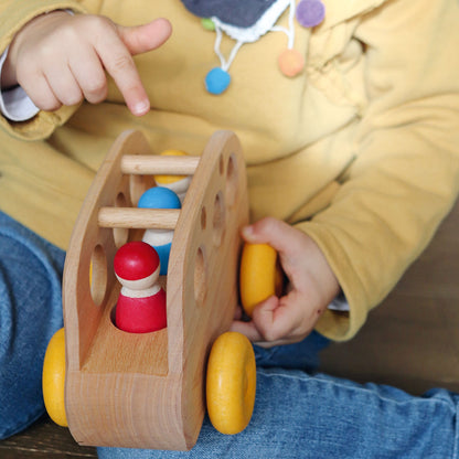 Grimm's Wooden Bus made from natural alder wood for imaginative open-ended play.