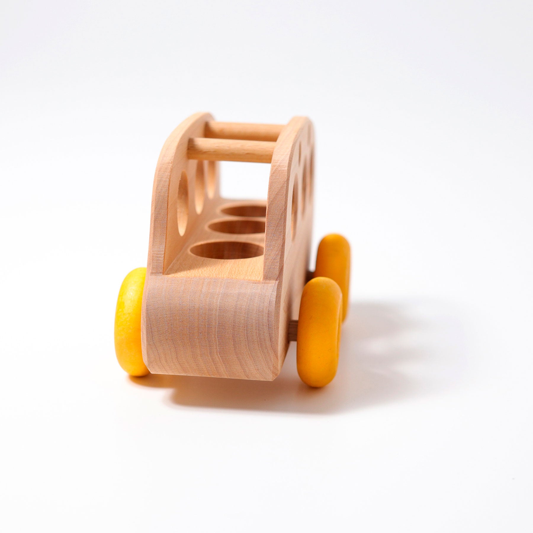 Grimm's Wooden Bus made from natural alder wood for imaginative open-ended play.