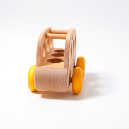 Grimm's Wooden Bus made from natural alder wood for imaginative open-ended play.