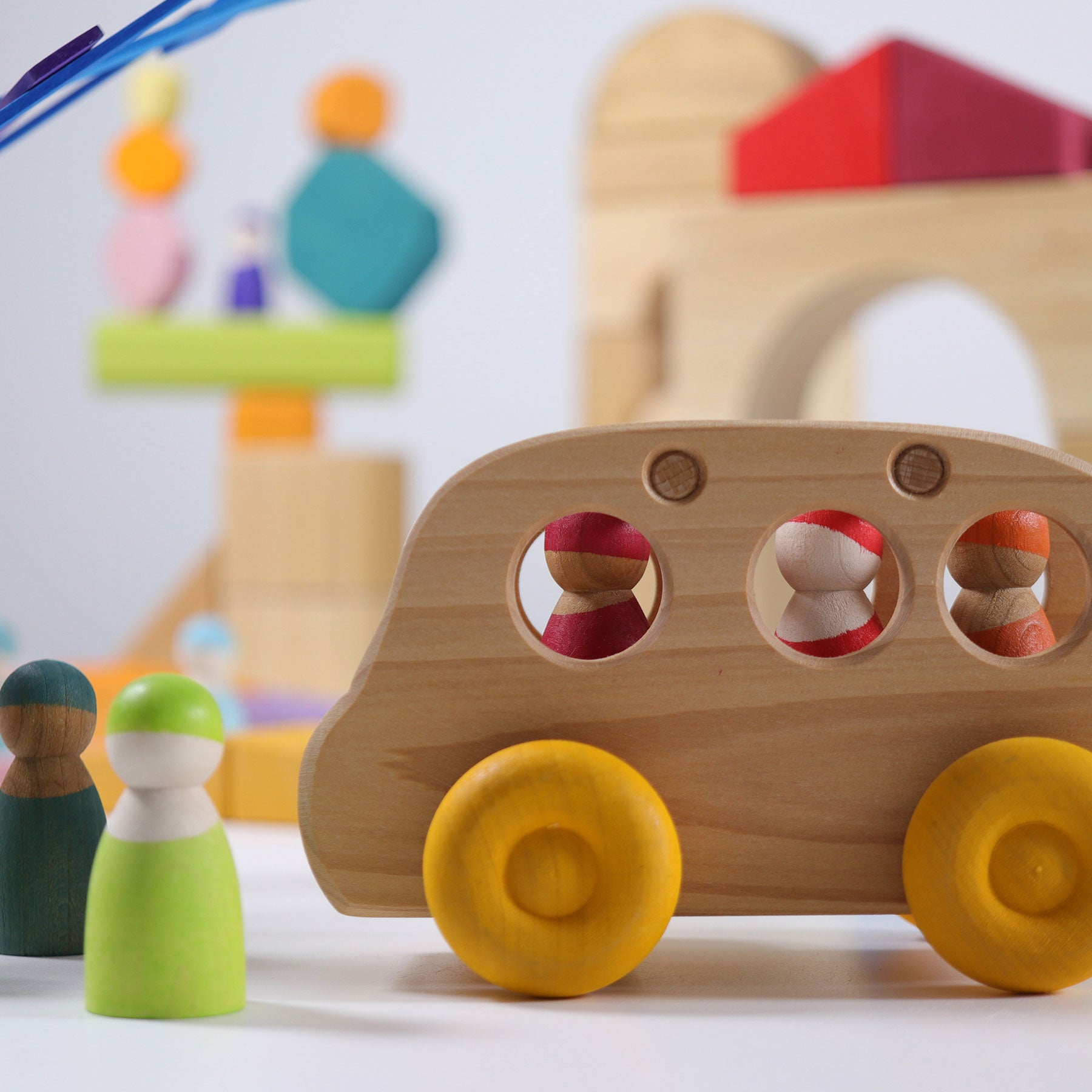 Grimm's Wooden Bus made from natural alder wood for imaginative open-ended play.
