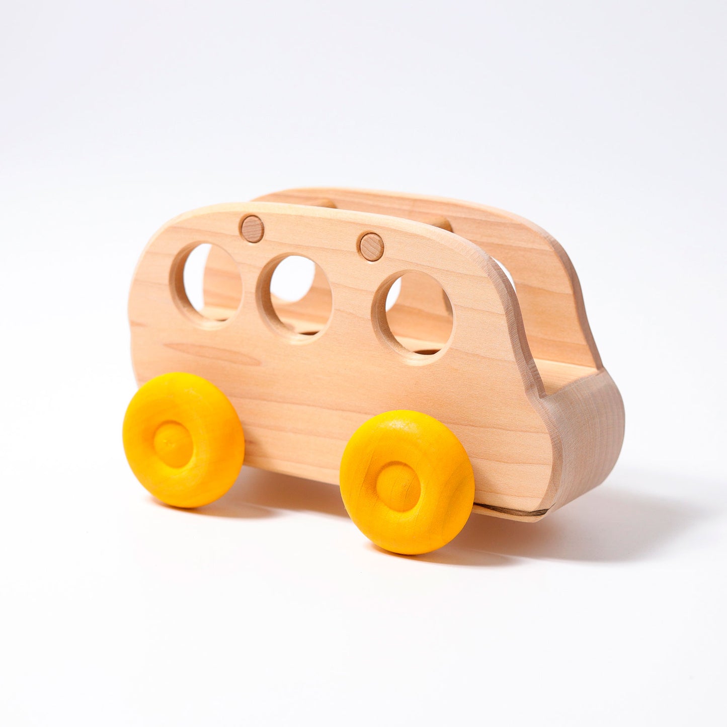 Grimm's Wooden Bus made from natural alder wood for imaginative open-ended play.