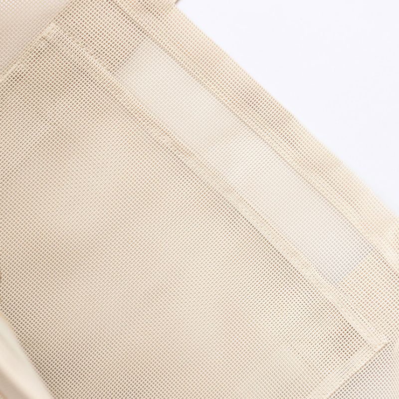 Internal mesh pocket for organisation in the Sande Kids beach bag in sand.