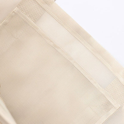 Internal mesh pocket for organisation in the Sande Kids beach bag in sand.