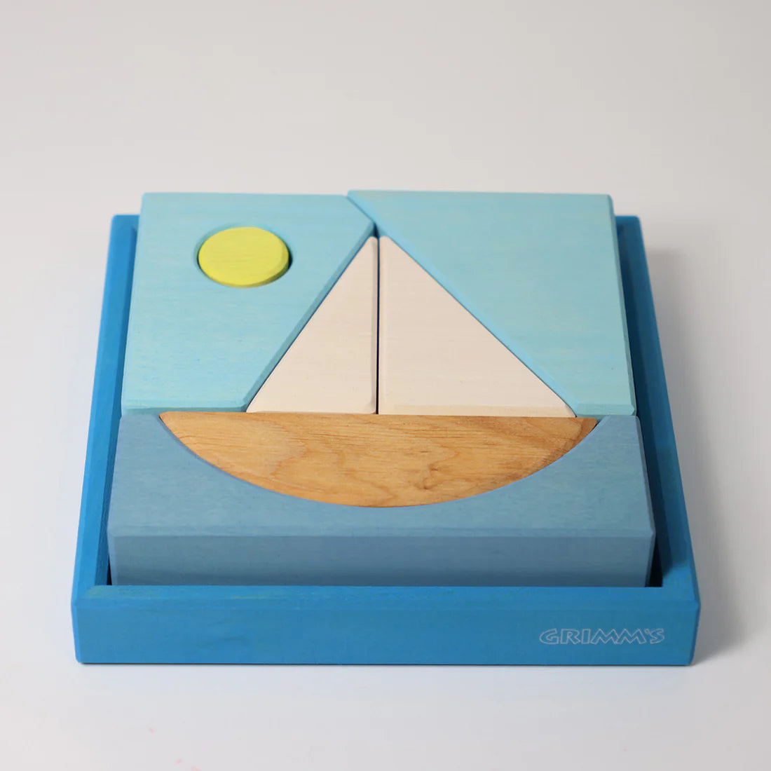 Grimm's Blue Building Set with large blue wooden blocks for creative building and open-ended imaginative play.
