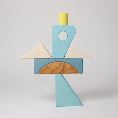 Grimm's Blue Building Set with large blue wooden blocks for creative building and open-ended imaginative play.
