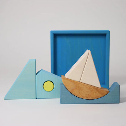 Grimm's Blue Building Set with large blue wooden blocks for creative building and open-ended imaginative play.