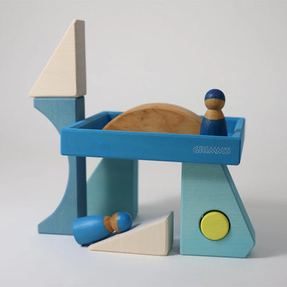 Grimm's Blue Building Set with large blue wooden blocks for creative building and open-ended imaginative play.