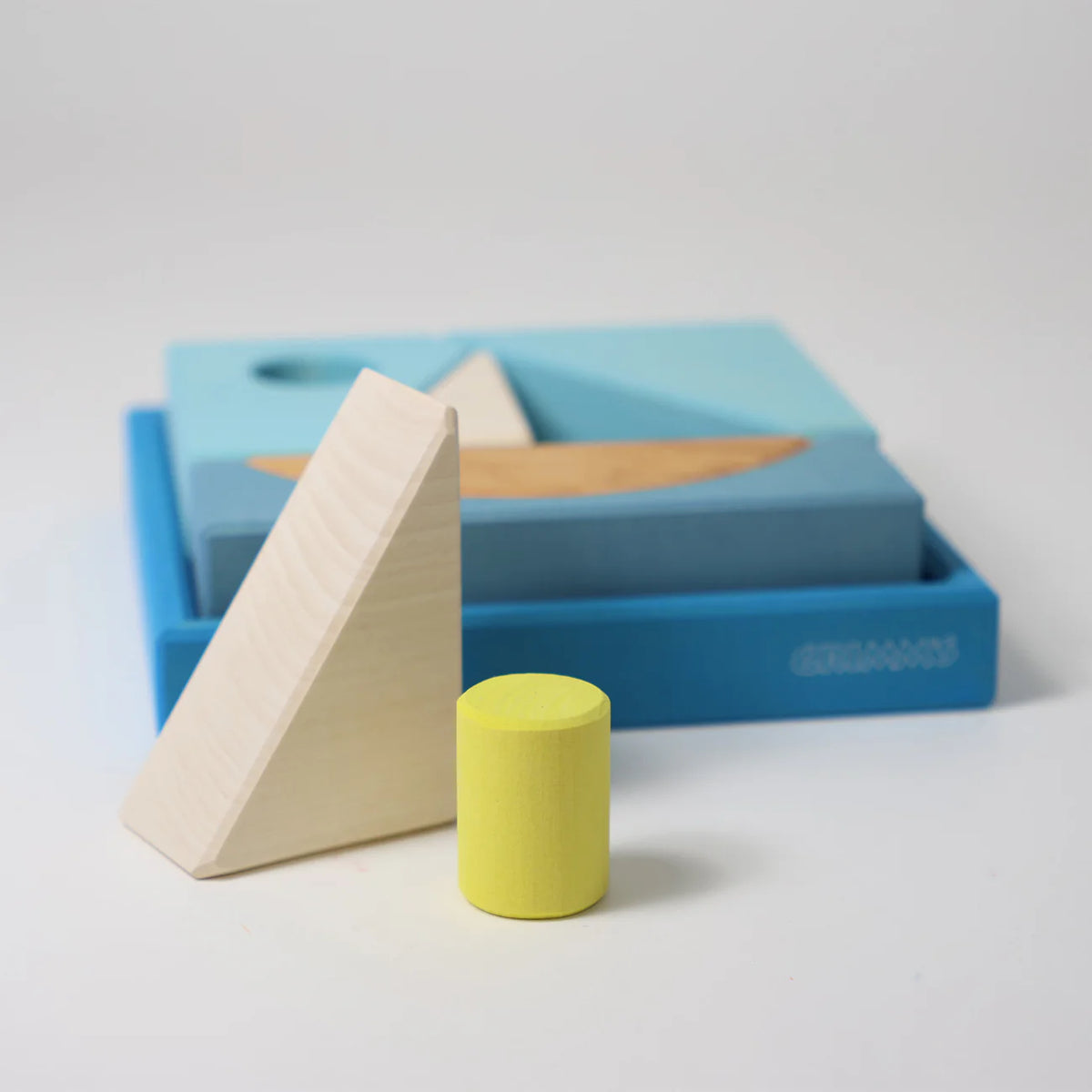 Grimm's Blue Building Set with large blue wooden blocks for creative building and open-ended imaginative play.
