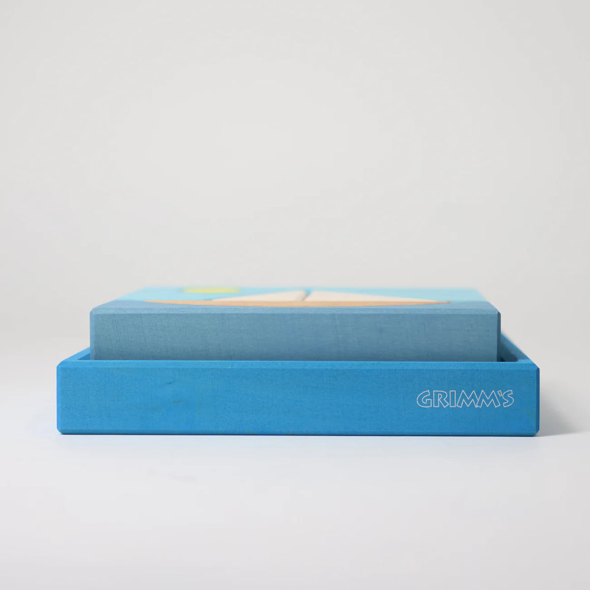 Grimm's Blue Building Set with large blue wooden blocks for creative building and open-ended imaginative play.