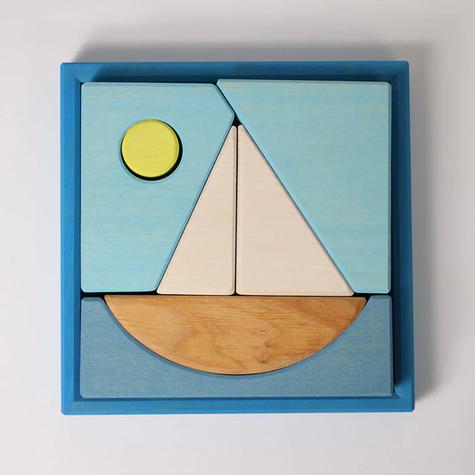 Grimm's Blue Building Set with large blue wooden blocks for creative building and open-ended imaginative play.