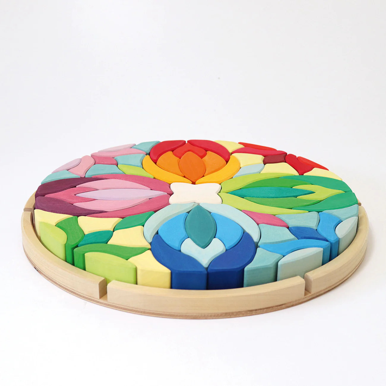 Grimm's Building Set Lara with 73 colourful curved wooden blocks for imaginative building and open-ended play.
