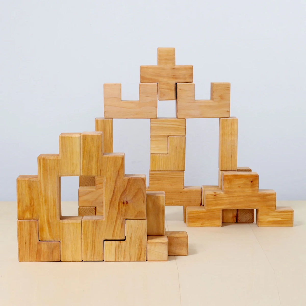 Grimm's Building Set Stairway with 19 natural alder wood building blocks for imaginative open-ended play.