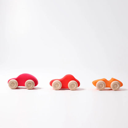 Grimm's Coloured Wooden Cars set of six handcrafted wooden vehicles for imaginative open-ended play.