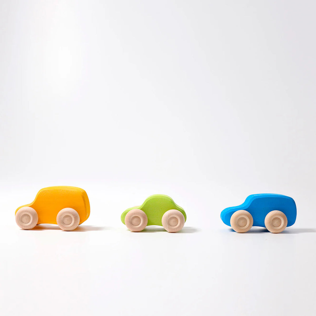 Grimm's Coloured Wooden Cars set of six handcrafted wooden vehicles for imaginative open-ended play.