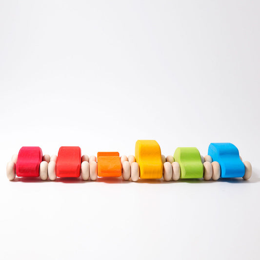 Grimm's Coloured Wooden Cars set of six handcrafted wooden vehicles for imaginative open-ended play.