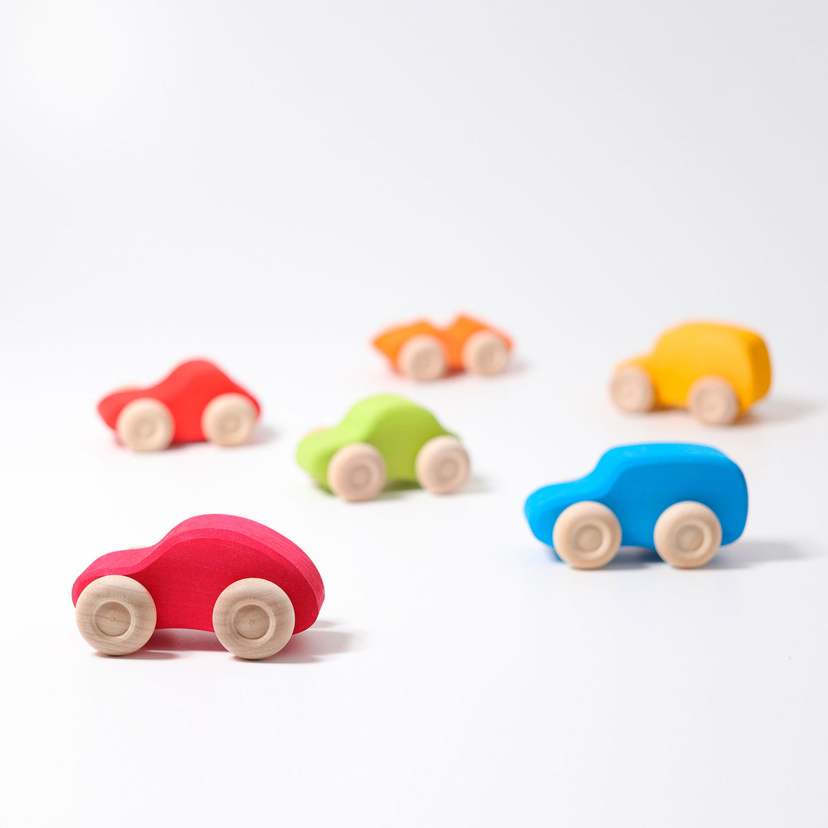 Grimm's Coloured Wooden Cars set of six handcrafted wooden vehicles for imaginative open-ended play.