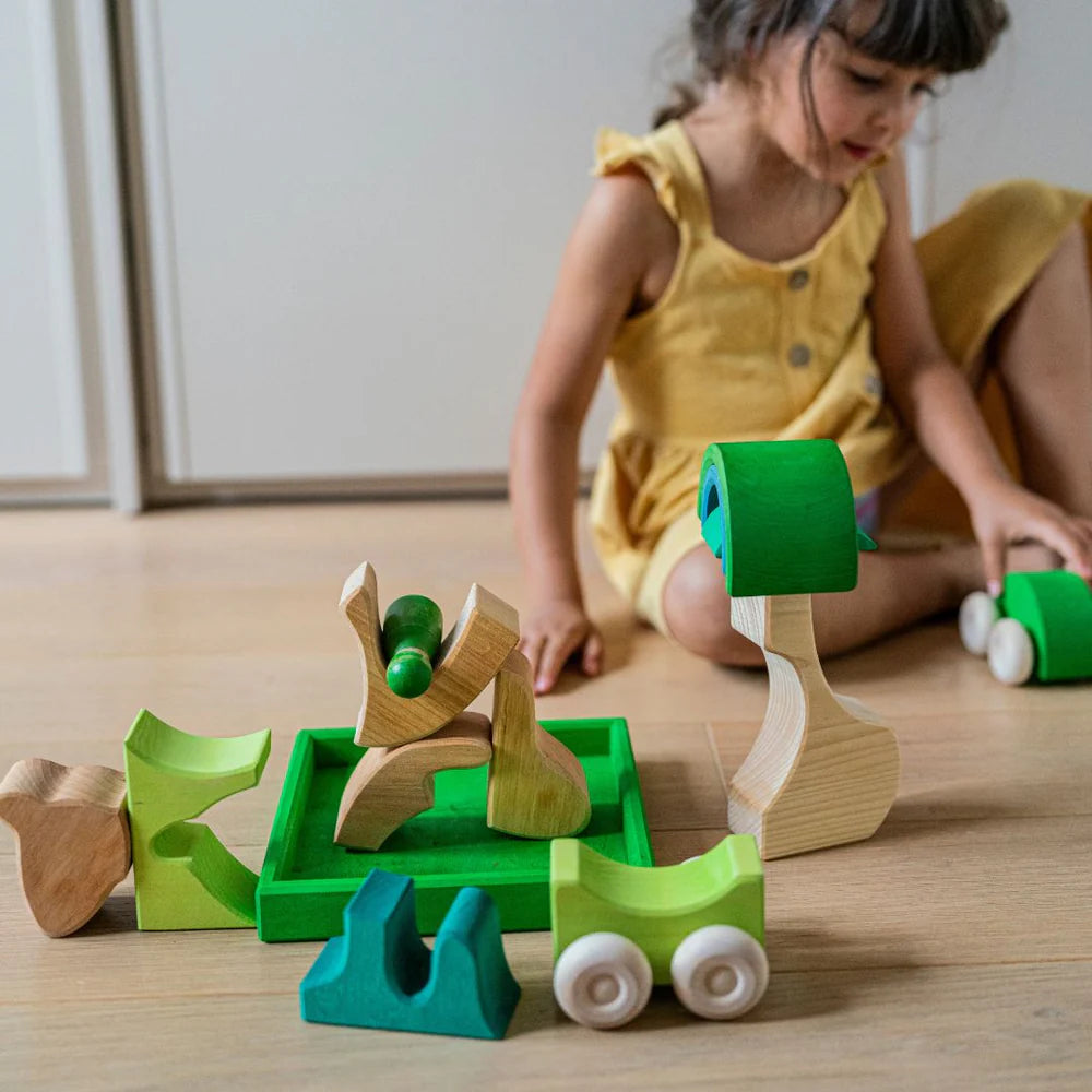 Grimm's Green Building Set with large green wooden blocks for creative, open-ended building and imaginative play.