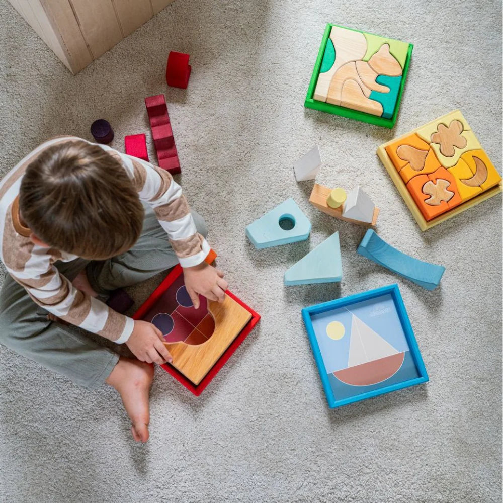 Grimm's Green Building Set with large green wooden blocks for creative, open-ended building and imaginative play.