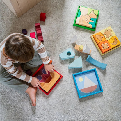 Grimm's Green Building Set with large green wooden blocks for creative, open-ended building and imaginative play.
