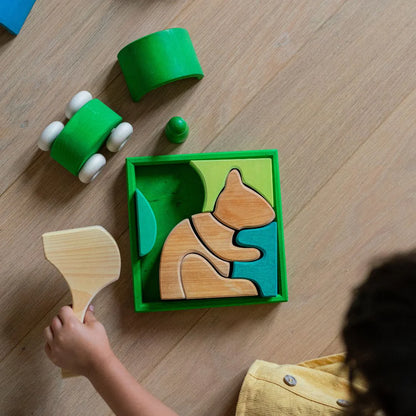 Grimm's Green Building Set with large green wooden blocks for creative, open-ended building and imaginative play.