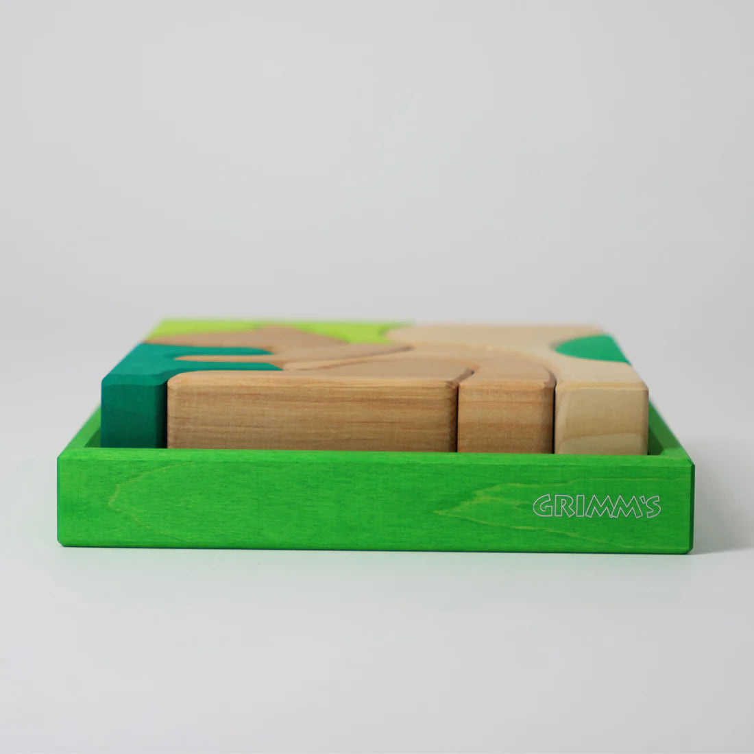 Grimm's Green Building Set with large green wooden blocks for creative, open-ended building and imaginative play.