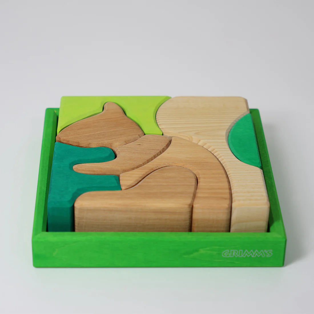 Grimm's Green Building Set with large green wooden blocks for creative, open-ended building and imaginative play.
