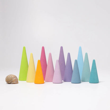 Grimm's Pastel Forest featuring 12 handcrafted wooden trees in soft pastel colours for small world play, imaginative storytelling and open-ended learning.