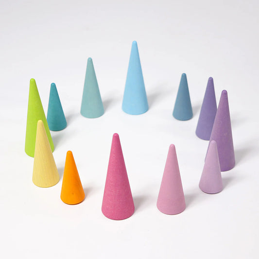 Grimm's Pastel Forest featuring 12 handcrafted wooden trees in soft pastel colours for small world play, imaginative storytelling and open-ended learning.