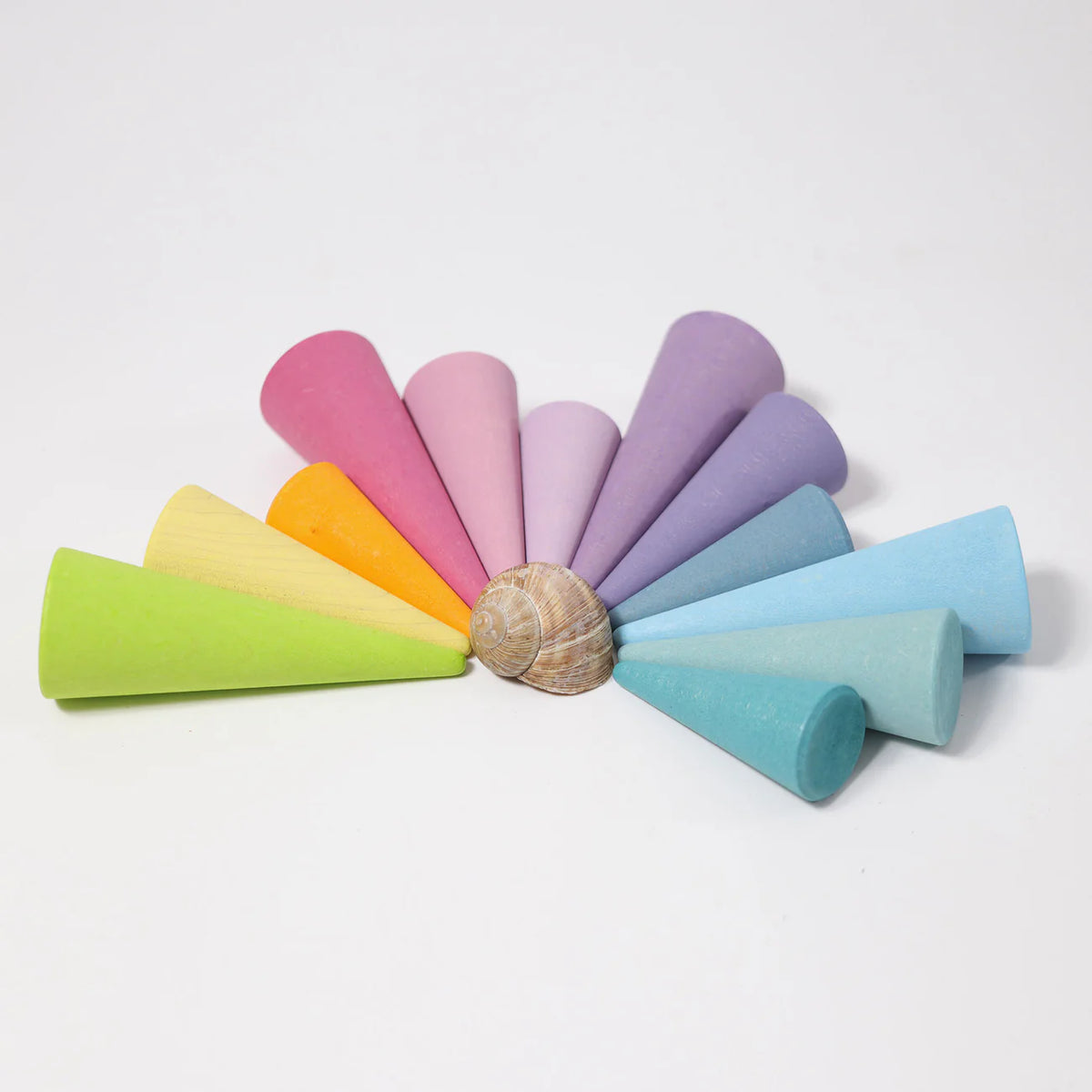 Grimm's Pastel Forest featuring 12 handcrafted wooden trees in soft pastel colours for small world play, imaginative storytelling and open-ended learning.