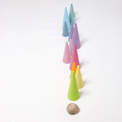 Grimm's Pastel Forest featuring 12 handcrafted wooden trees in soft pastel colours for small world play, imaginative storytelling and open-ended learning.