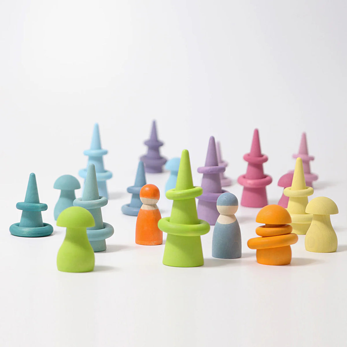 Grimm's Pastel Forest featuring 12 handcrafted wooden trees in soft pastel colours for small world play, imaginative storytelling and open-ended learning.